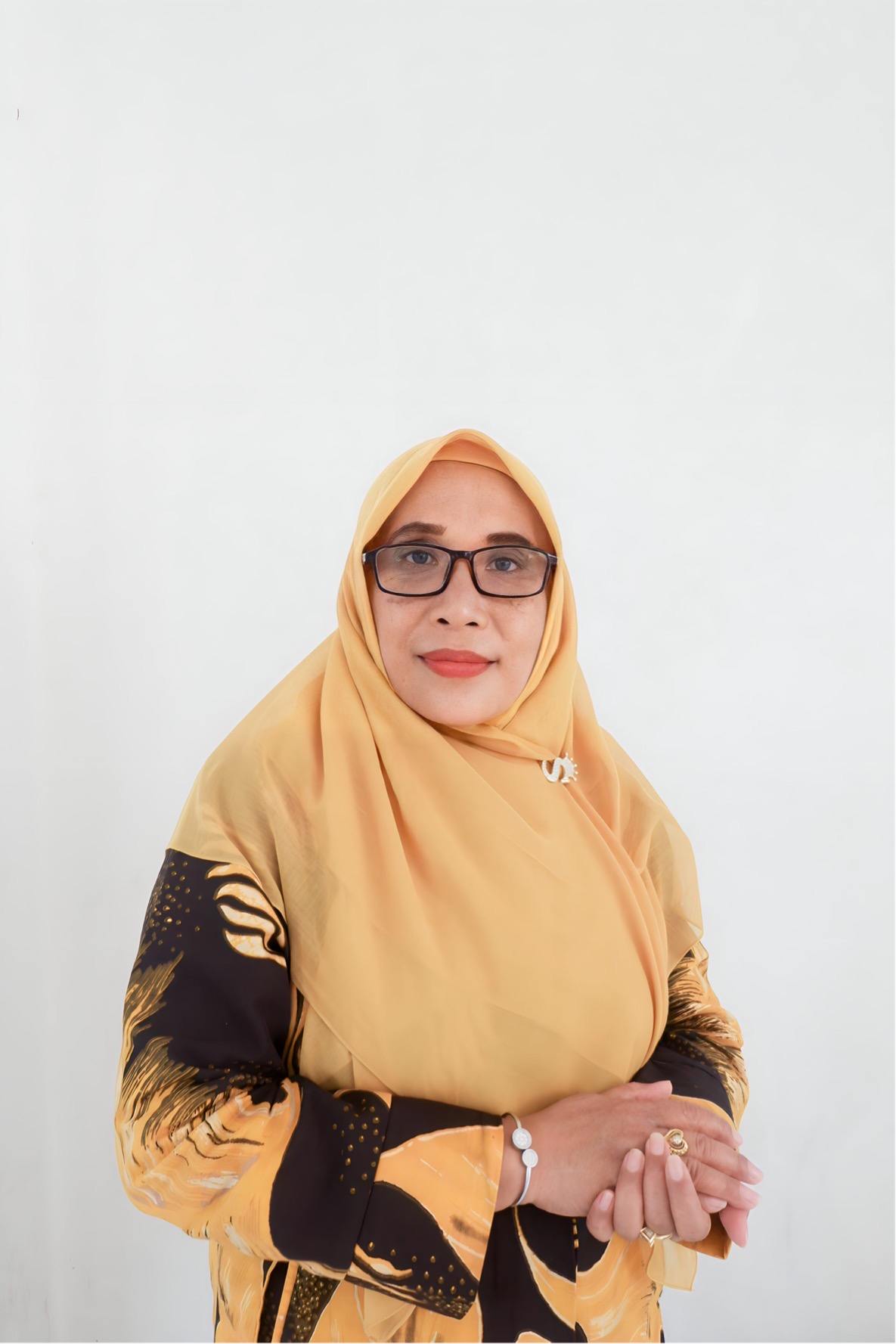 Dr. Wahyuni, M.Si